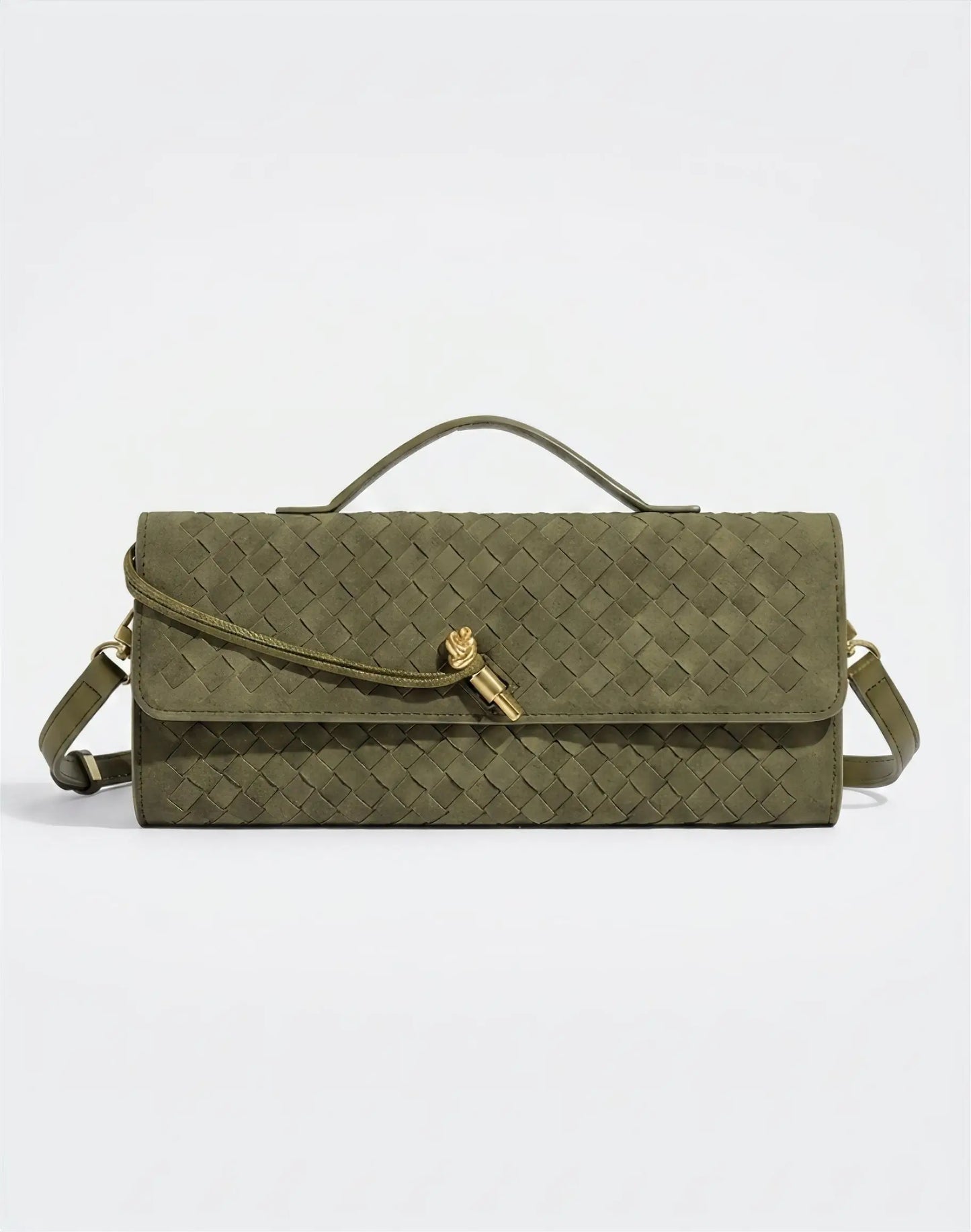 Green handbag with a gold clasp on a light gray background